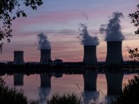 TOPSHOT - White steam billows from the Cattenom nuclear power plant, at sunset in Cattenom, eastern France, on June 2, 2020. - Cattenom is the ninth largest nuclear power station in the world. (Photo by SEBASTIEN BERDA / AFP) (Photo by SEBASTIEN BERDA/AFP via Getty Images)