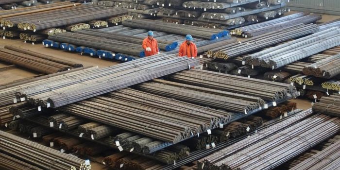 Workers check steel products at a factory in Dalian, Liaoning Province, China, March 30, 2016. REUTERS/China Daily